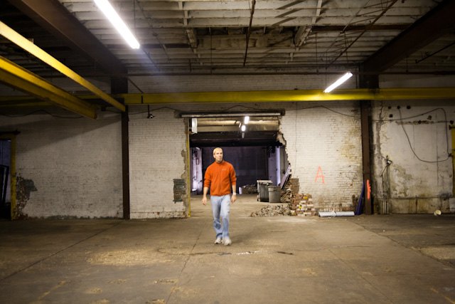Cultural entrepreneur Peter Hopkins showing 299 Meserole, promising new cultural center of the area.
