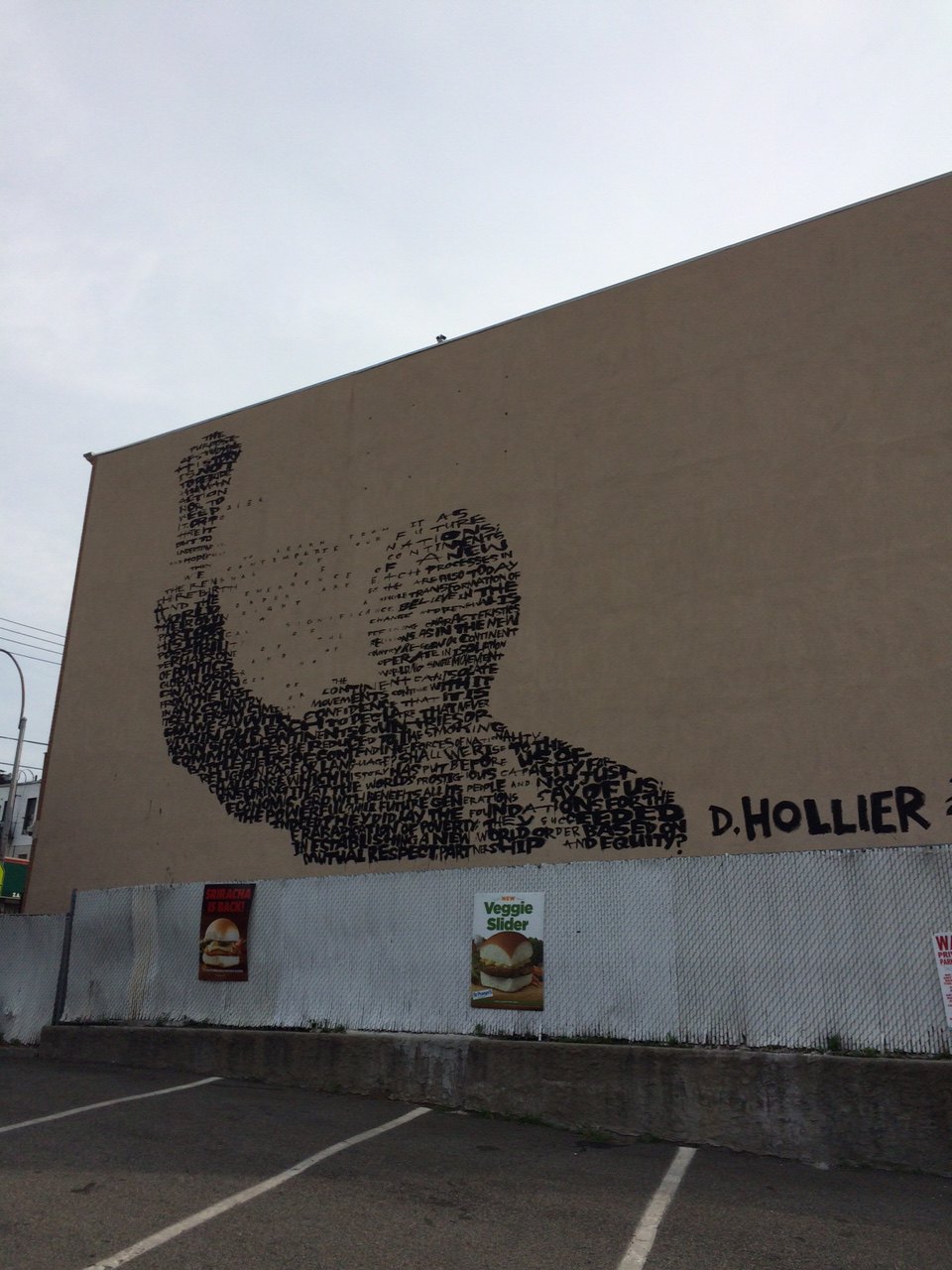 Giant Nelson Mandela Mural Appears Overnight, Transforming White Castle Parking Lot