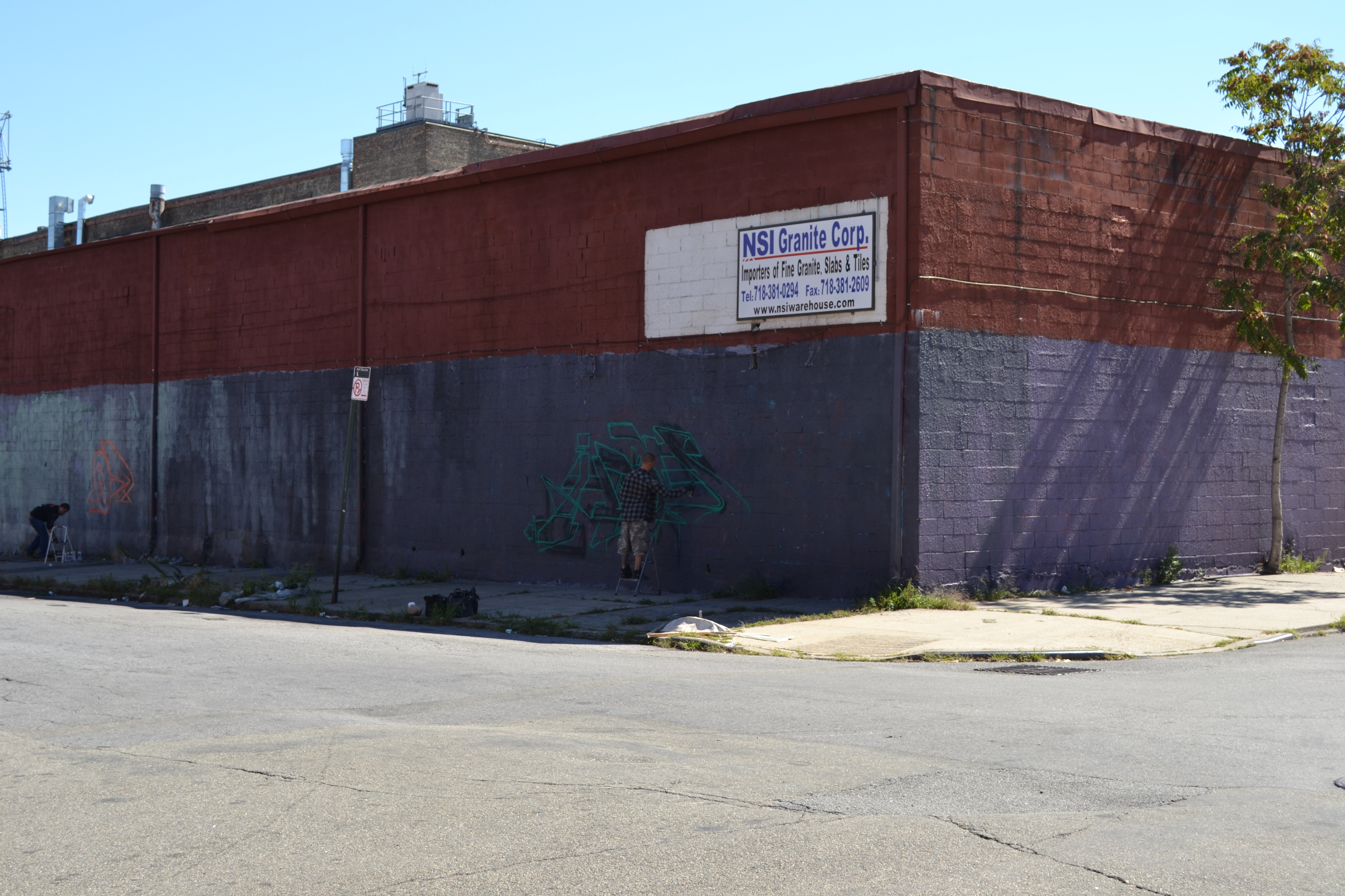 An international photo wire just told the world Bushwick is a street art hub, over one shot of graffiti on old factory walls