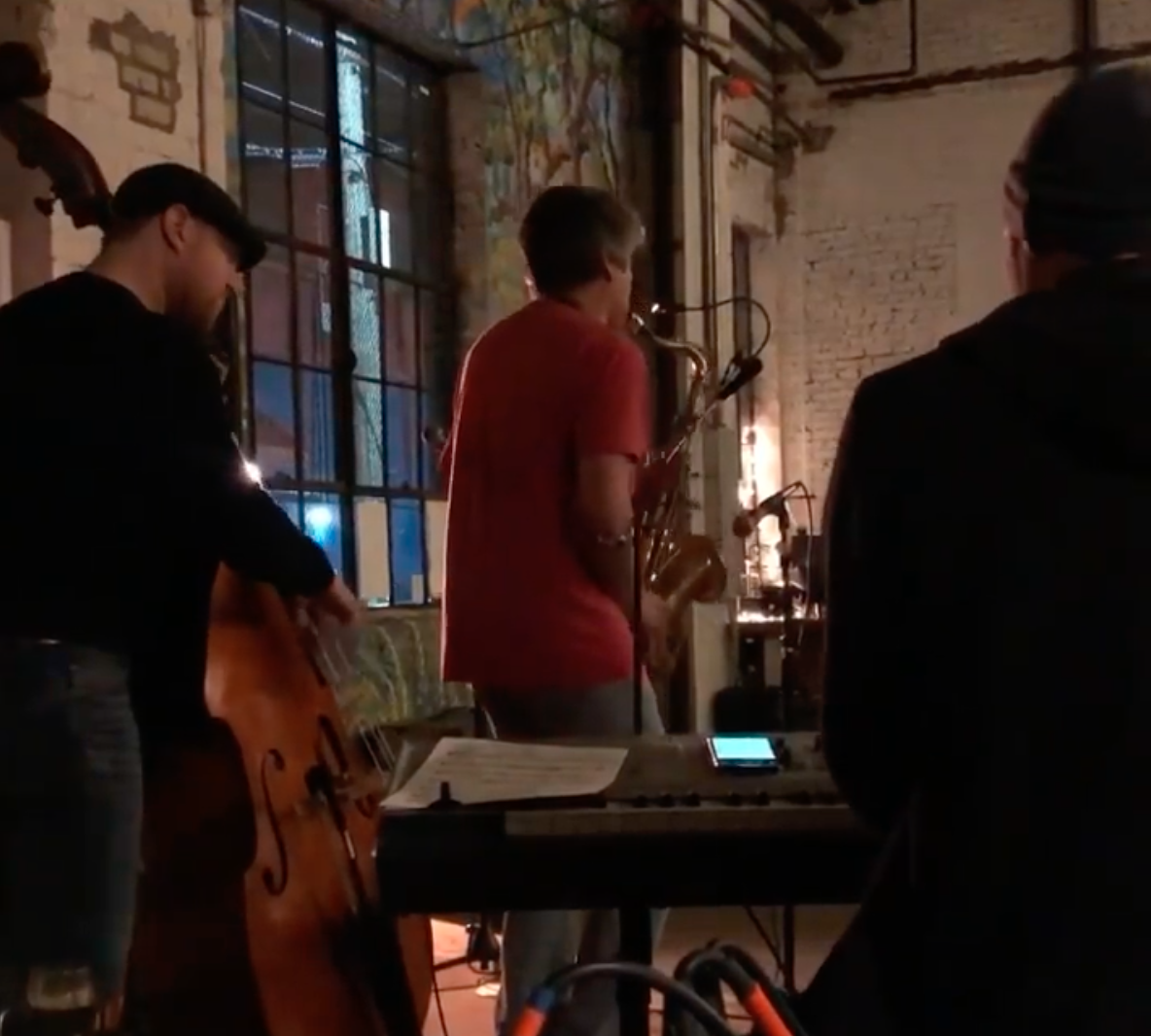 Performers playing during jazz night at Queens Brewery.