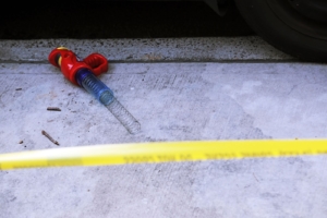 child's toy with crime tape in front of it