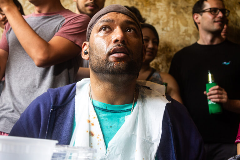 Scenes From a Hot Wing Eating Contest In Bushwick