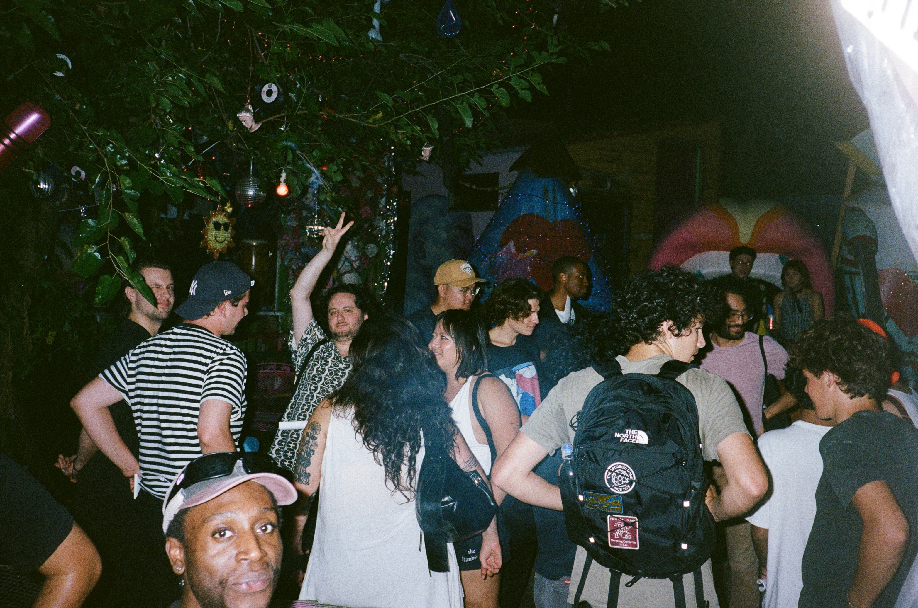 Crowd mingling at Longshot Cinema event