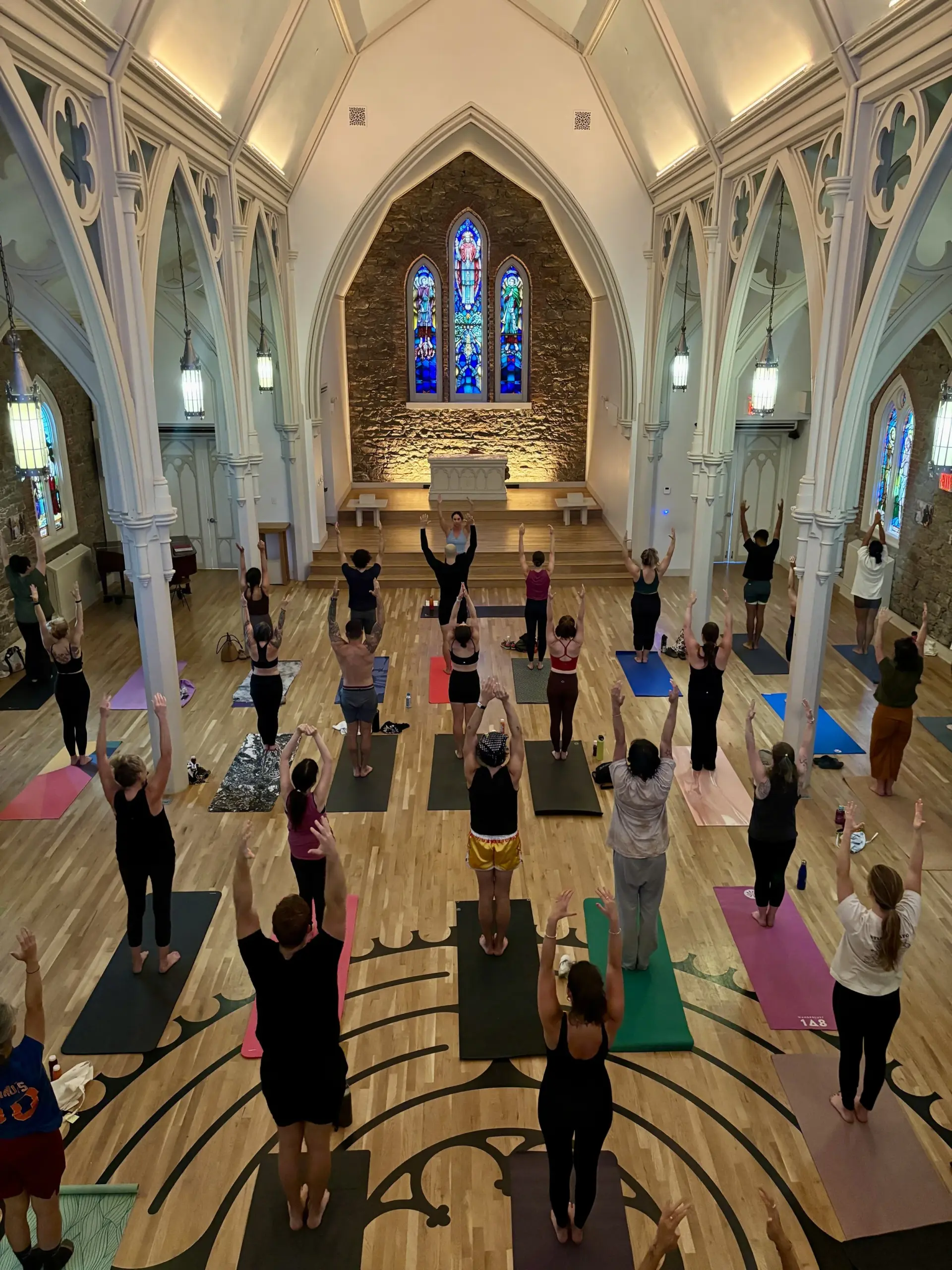 A $10 yoga class in a Greenpoint church basement is quietly funding 2,000 meals a week
